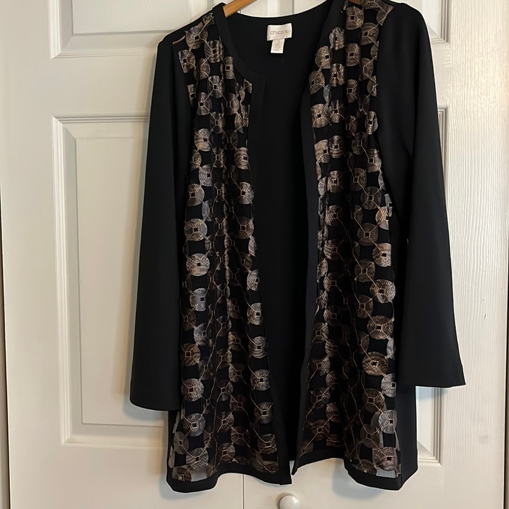 Chico’s ladies top or slip on cover.